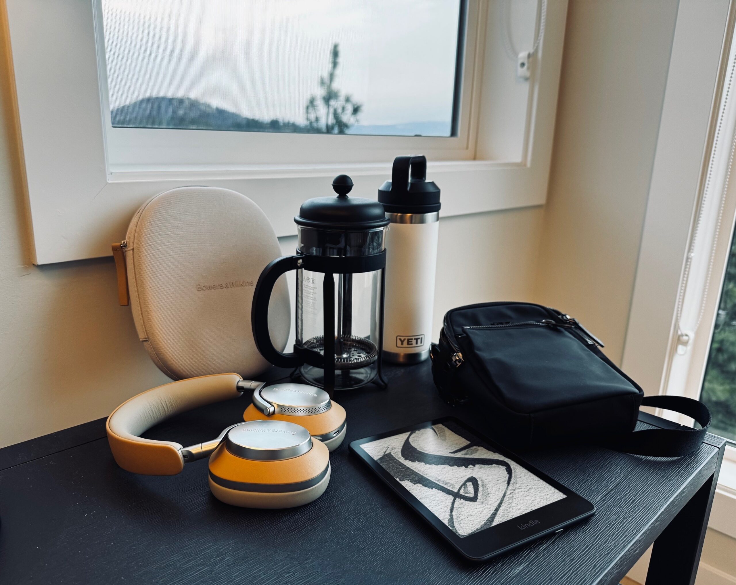 What’s Always in Our Carry-On: Travel Essentials We Swear By